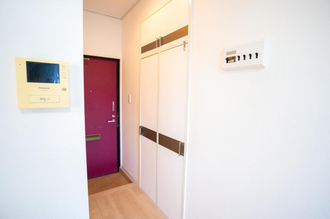 スマイルハイツ Lägenhet Naha Exteriör bild